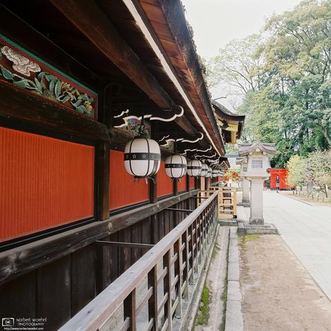Perspective along one of the halls of Kitano Tenmangu in Kyoto, Japan.