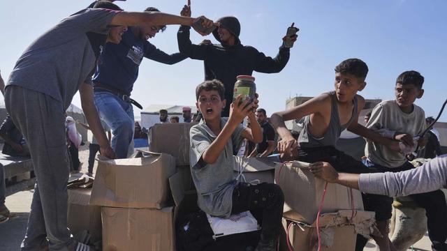 Israeli gunfire heard as Palestinians crowd aid center in Gaza
