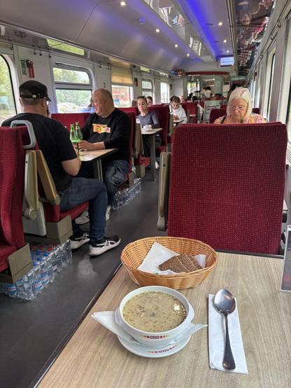 Dining car interior, with bowl of soup on table