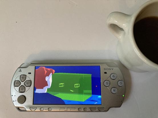 A photo of a PSP playing Another World/Out of this World.

It is a scene where Professor Chaykin playing physicist on his Peanut OS computer. He sits in front of a 3D monochrome screen clicking on icons.