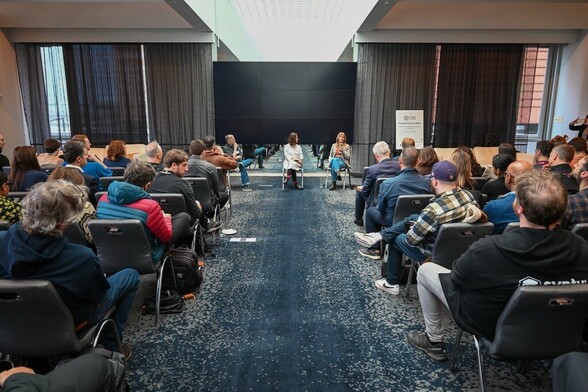 speakers'panel at GDC event facing audience