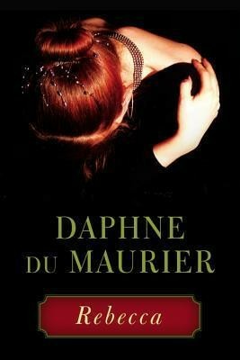 The cover of the book Rebecca by Daphne du Maurier. The background color of the cover is black

Centered at the top, we see the image of a woman seen from above, looking down. The perspective means that her face isn't visible at all, but we can see that her hair has been done, and she's wearing a necklace. She's holding her hand up to her shoulder in a slightly awkward pose

The image is all bright lights and dark shadows, and seems uncanny and unsettling.